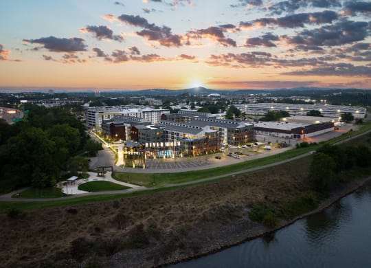 arial view of the campus with the sun setting in the background at Abberly Riverwalk Apartment Homes, Nashville, 37228