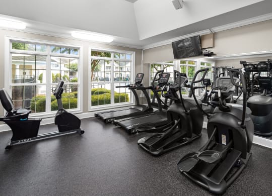 Gym with cardio equipment at Abberly Grove Apartment Homes, North Carolina, 27610