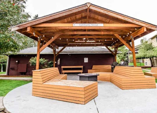 A wooden pavilion with a sign at Altitude Apartment, Tacoma, WA, 98444
