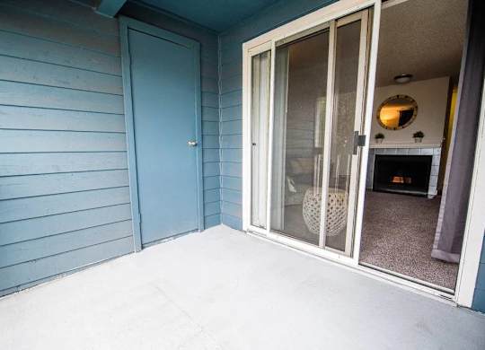 A blue door is on the left and a glass door is on the right at Altitude Apartment , Washington, 98444