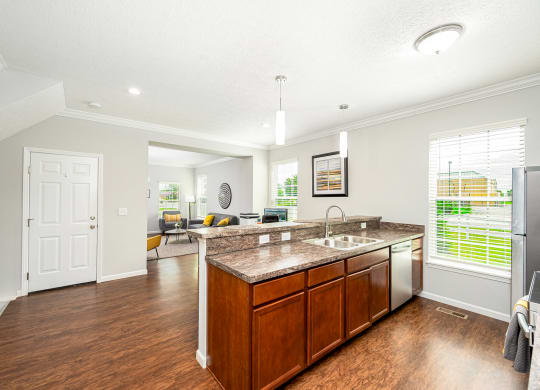 a kitchen with a sink and a counter top