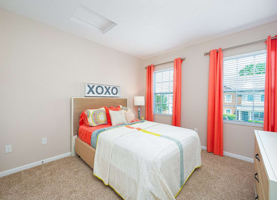 a spiral bed in a room with a circle of windows