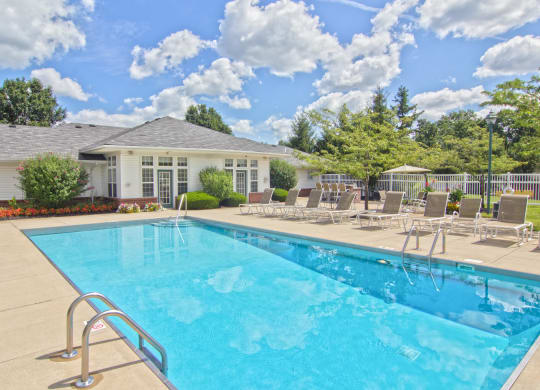 our apartments have a resort style pool with chairs