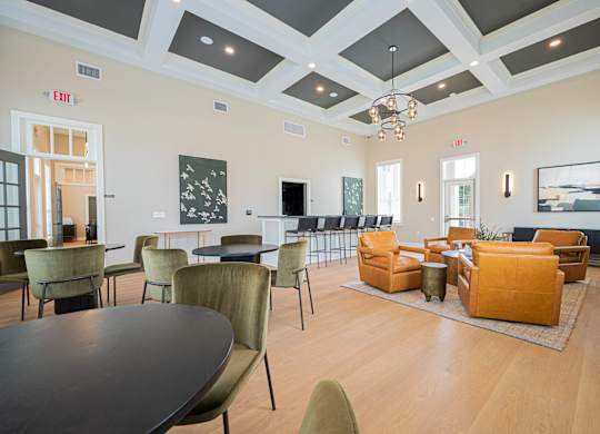A room with a table and chairs.