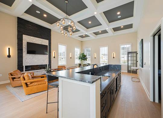 A modern kitchen with a black and white color scheme.