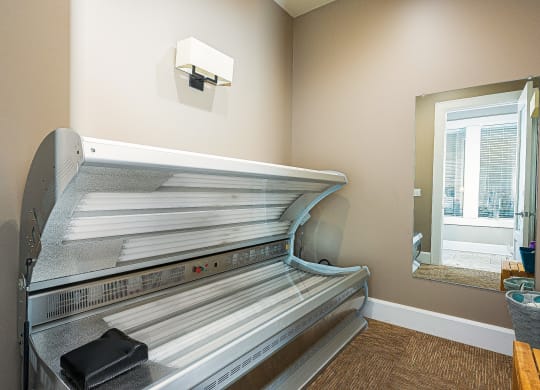 a room with a bed and a closet with papers on it