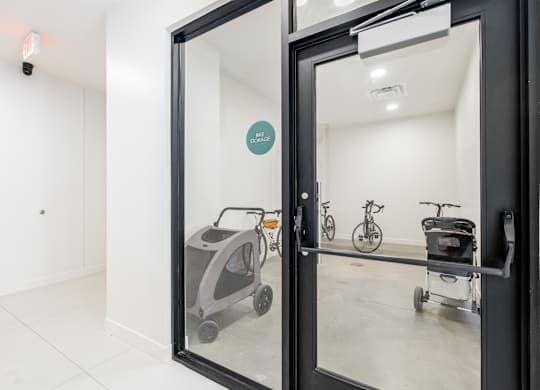 A glass door with a sign that says