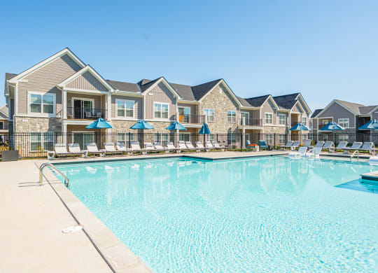 the swimming pool at the preserve at polo ridge apartments in dripping springs tx