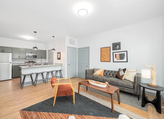 a living room with a couch and a table