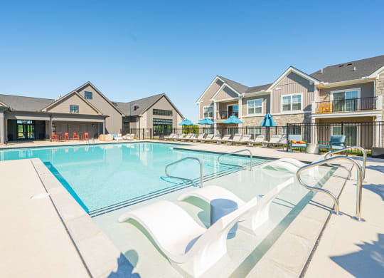 our apartments have a large swimming pool with lounge chairs