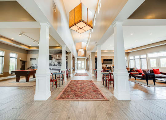 the preserve at cardinal courts spacious lobby with piano and tables