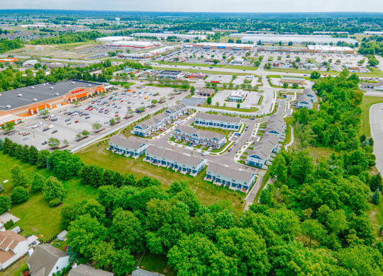 an aerial view of a parking lot in a city