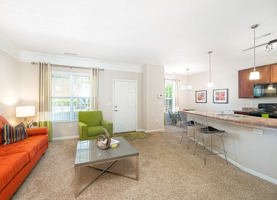 a living room with an orange couch