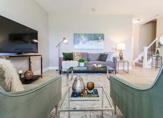 a living room with two couches and a coffee table