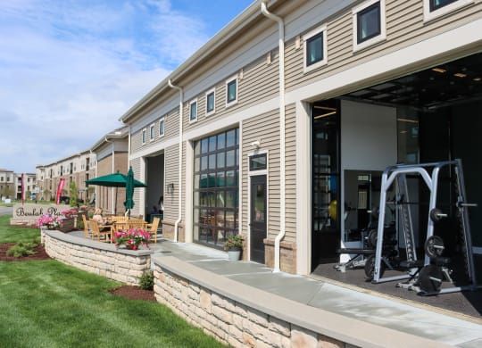 Indoor and Outdoor Clubhouse at The Strand Luxury 2 bedroom townhomes in Grove City Ohio near Columbus