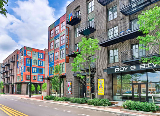 a rendering of a building on a city street