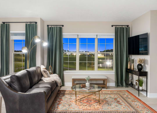 Living room at the strand at beulah townhome apartments