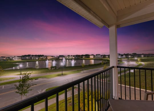 A balcony at The Strand Townhomes overlooking the pond at Beulah Park in Grove City Ohio near Columbus