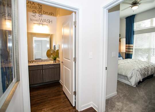 A bathroom with a towel brush and towel wash sign.