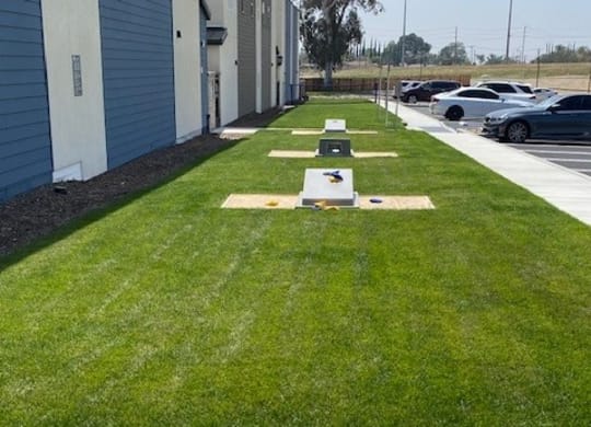 a row of ping pong tables in the grassat Westbury Apartments, Rancho Cucamonga, CA