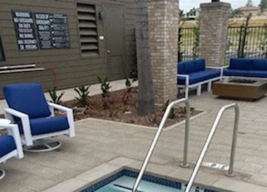 a small swimming pool with a stainless steel hand railat Westbury Apartments, Rancho Cucamonga, California