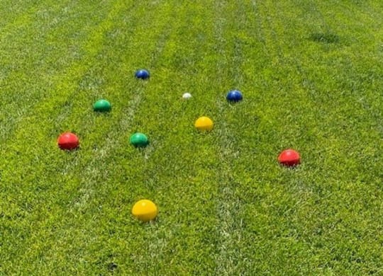 a group of colored balls in the grassat Westbury Apartments, Rancho Cucamonga, 91739