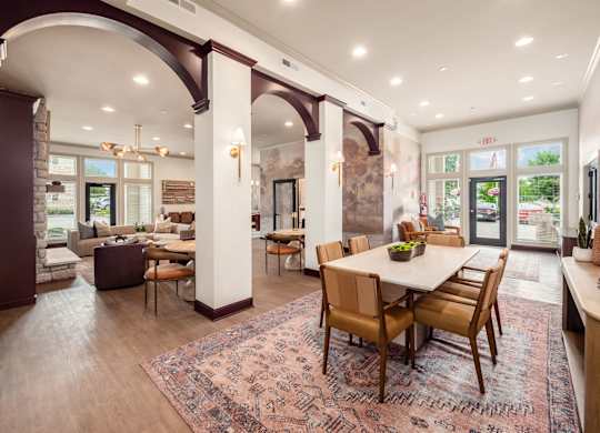 A large dining room with a table set for six.