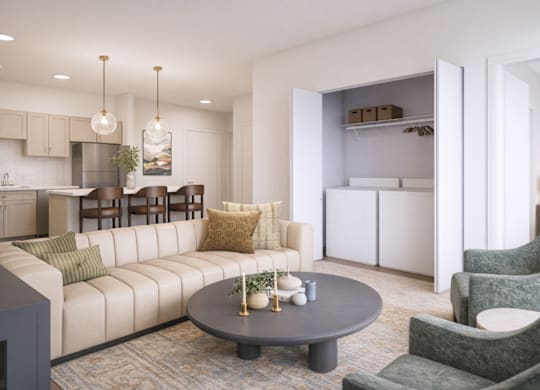 A modern living room with a grey coffee table and a white sofa.