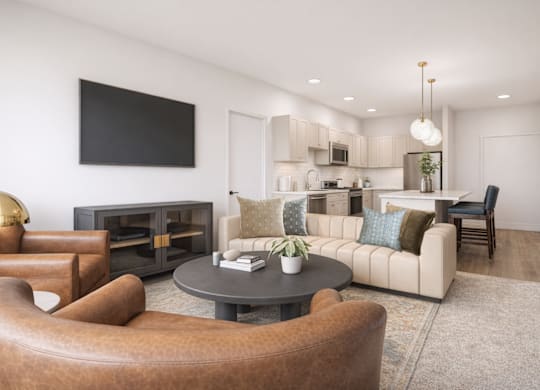 A modern living room with a brown leather chair and a grey coffee table.