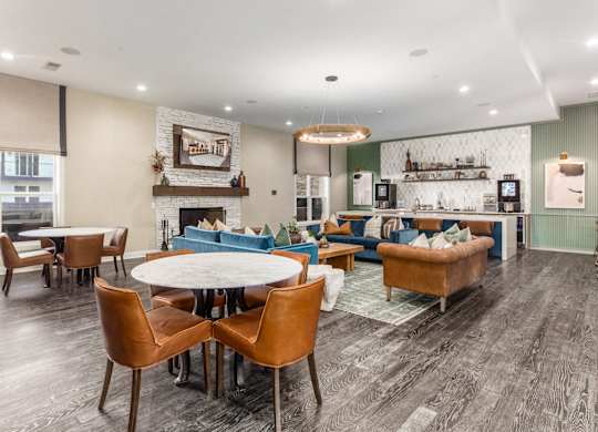 A modern living room with a fireplace and a dining table.