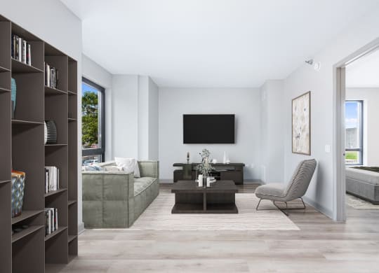 a living room with a couch and a coffee table and a television
