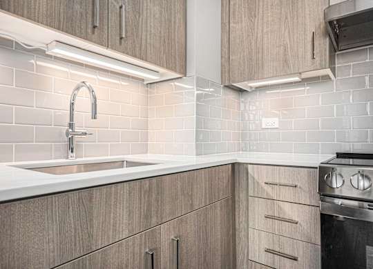 Stainless Steel Sink With Faucet In Kitchen at Thrive Exchange, Chicago, IL, Illinois