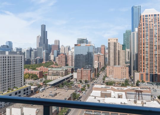 a view of the city from a balcony at One 333, Chicago, IL
