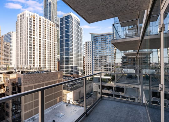 views of the city from the balcony of a high rise condo at One 333, Chicago, 60605