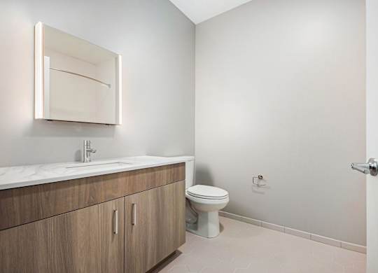 Modern Bathroom with Framed Mirror at Thrive Exchange, Chicago, Illinois