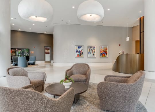the lobby of a hotel with chairs and a table  at Cassidy on Canal, Chicago, 60606