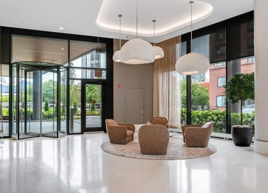 a dining room with chairs and a table in a lobby  at Cassidy on Canal, Chicago, 60606