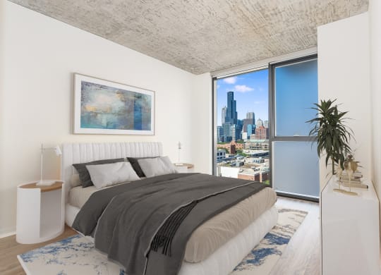 a bedroom with a bed and a large window at One 333, Chicago, Illinois