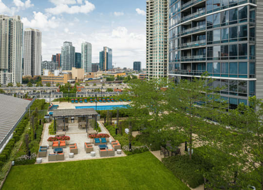 Outdoor elevated dining, garden and pool area at Kingsbury Plaza, Illinois, 60654