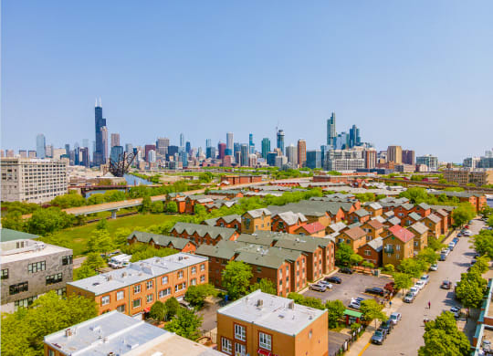 an aerial view of chicago with the chicago skyline in the background
