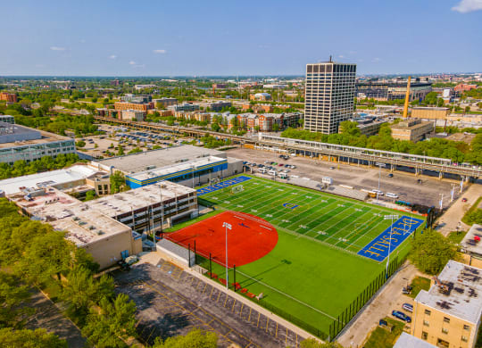 a view of the football field from the top of a building