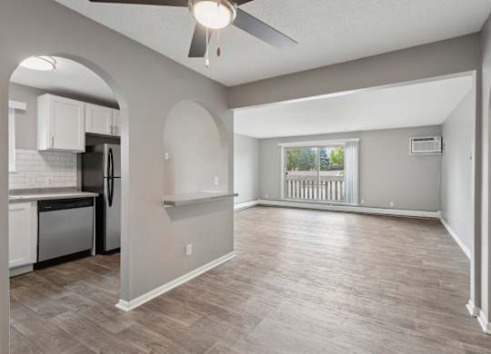 Open concept living room with kitchen at Cedarvale Highlands Apartments, Eagan, MN
