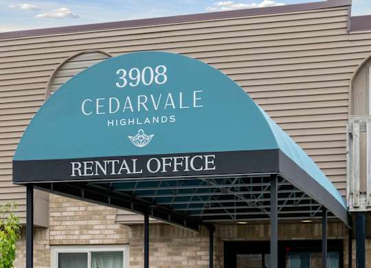 Rental office entrance with covered walkway1 at Cedarvale Highlands Apartments, Eagan