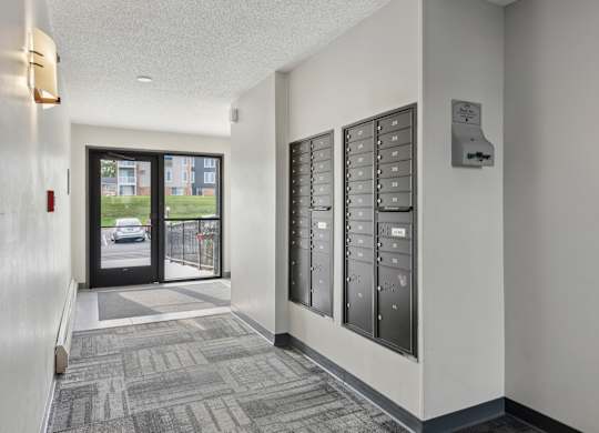 Mailroom with secure resident mailboxes at Cedarvale Highlands Apartments, Minnesota