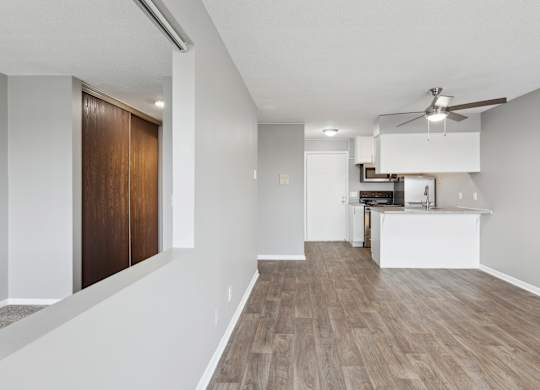 Modern open concept apartment with kitchen island at Cedarvale Highlands Apartments, Eagan, MN 55122
