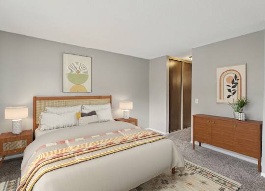 Master bedroom with mid century modern furniture at Cedarvale Highlands Apartments, Eagan, MN