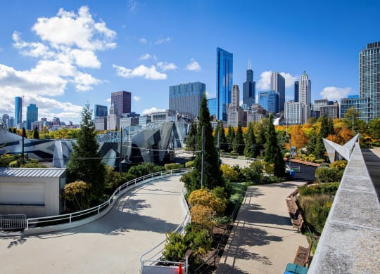 a view of a park with a city in the background at Columbus Plaza, Chicago