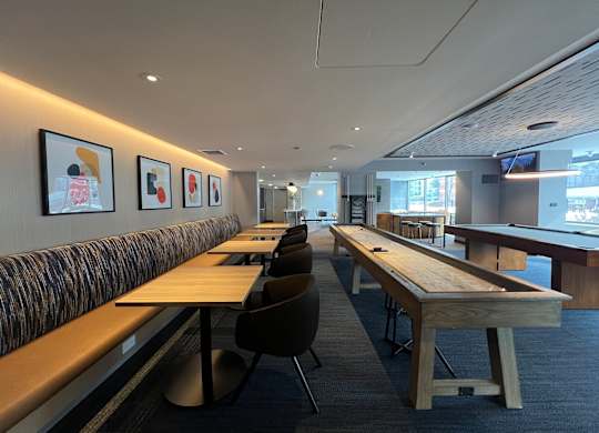 A conference room with a long table and chairs at Kingsbury Plaza, Chicago, IL, 60654