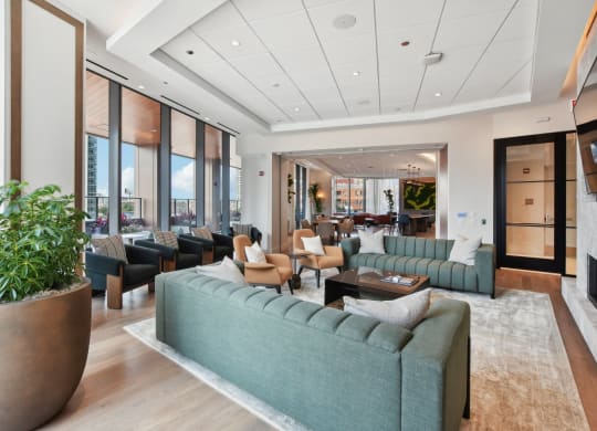 the lobby of a hotel with couches and chairs at Cassidy on Canal, Chicago, IL, 60654