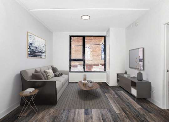 a living room with a couch and a table